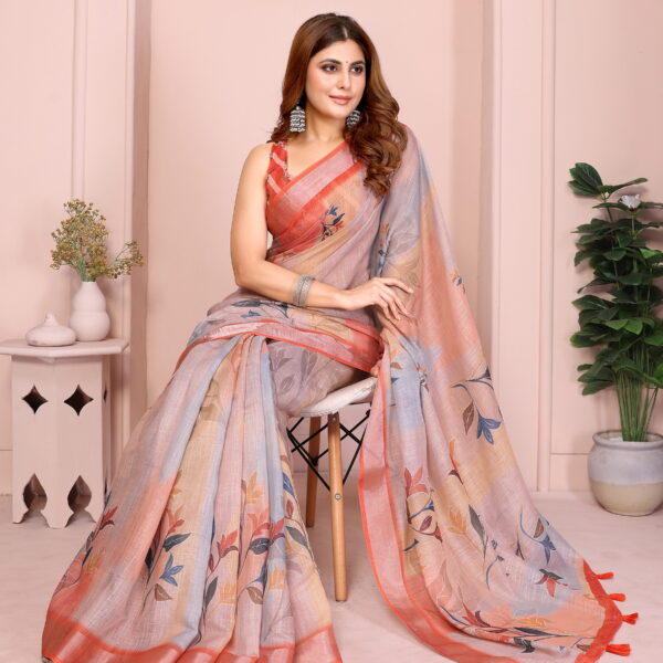 elegant floral saree with orange tassels